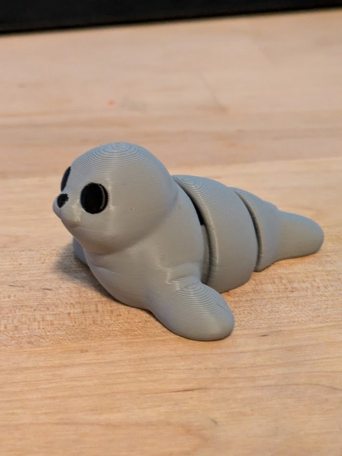 baby manatee keychain